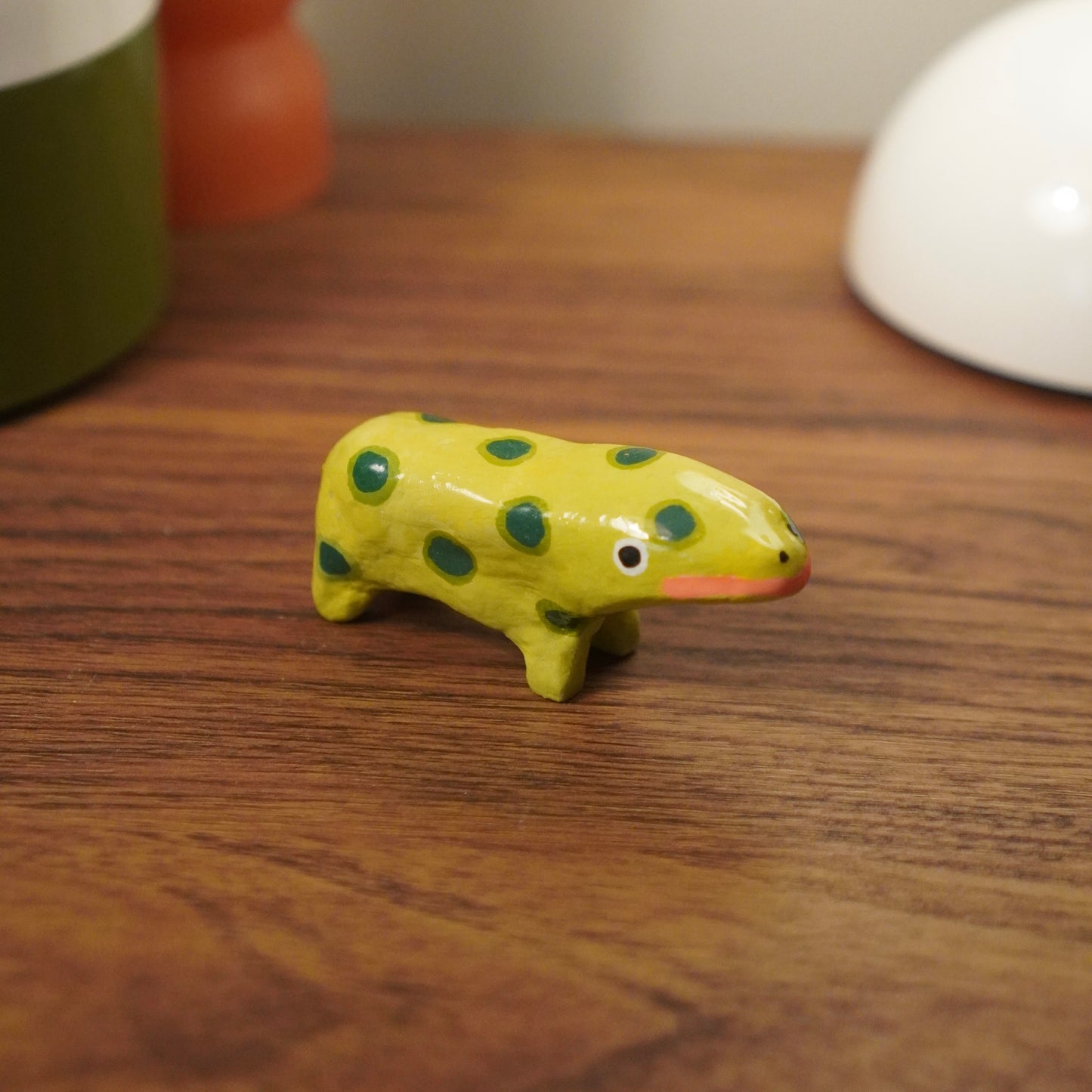 spotted green animal figurine