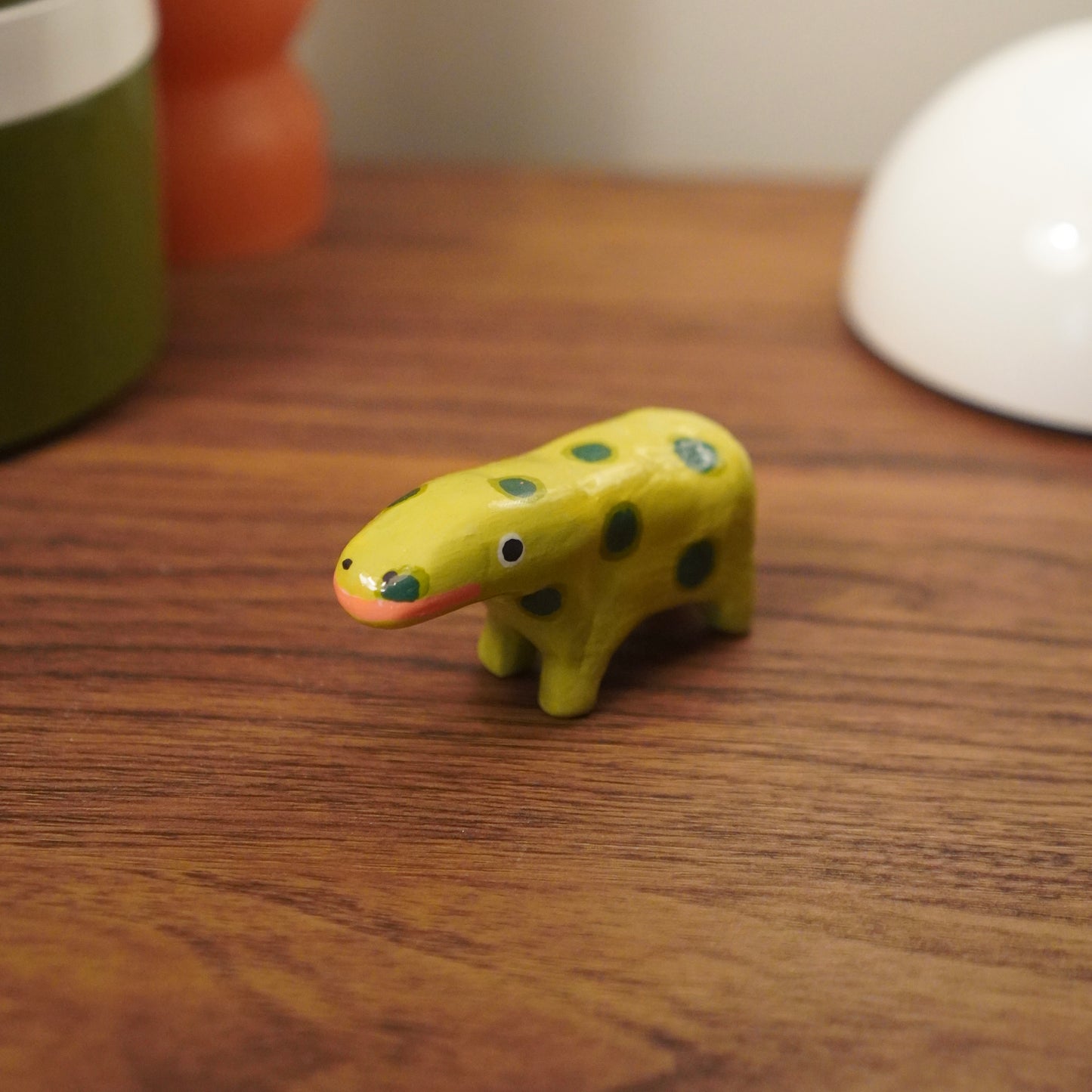 spotted green animal figurine