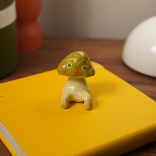 bolete sitting figurine