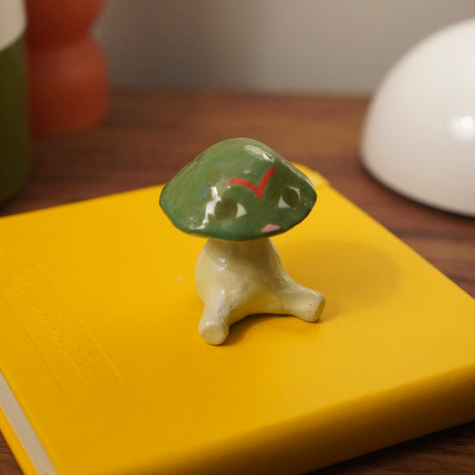 amanita sitting figurine