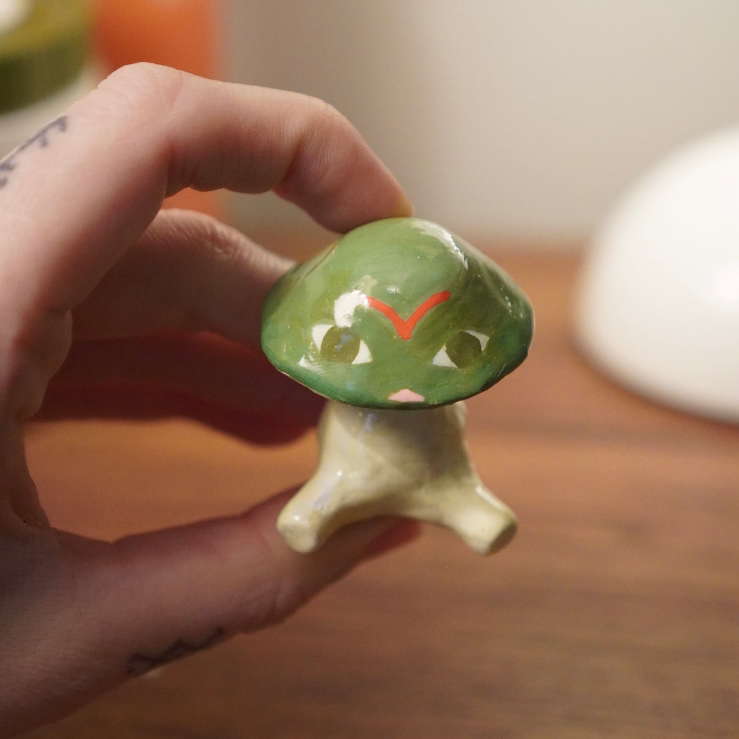 amanita sitting figurine