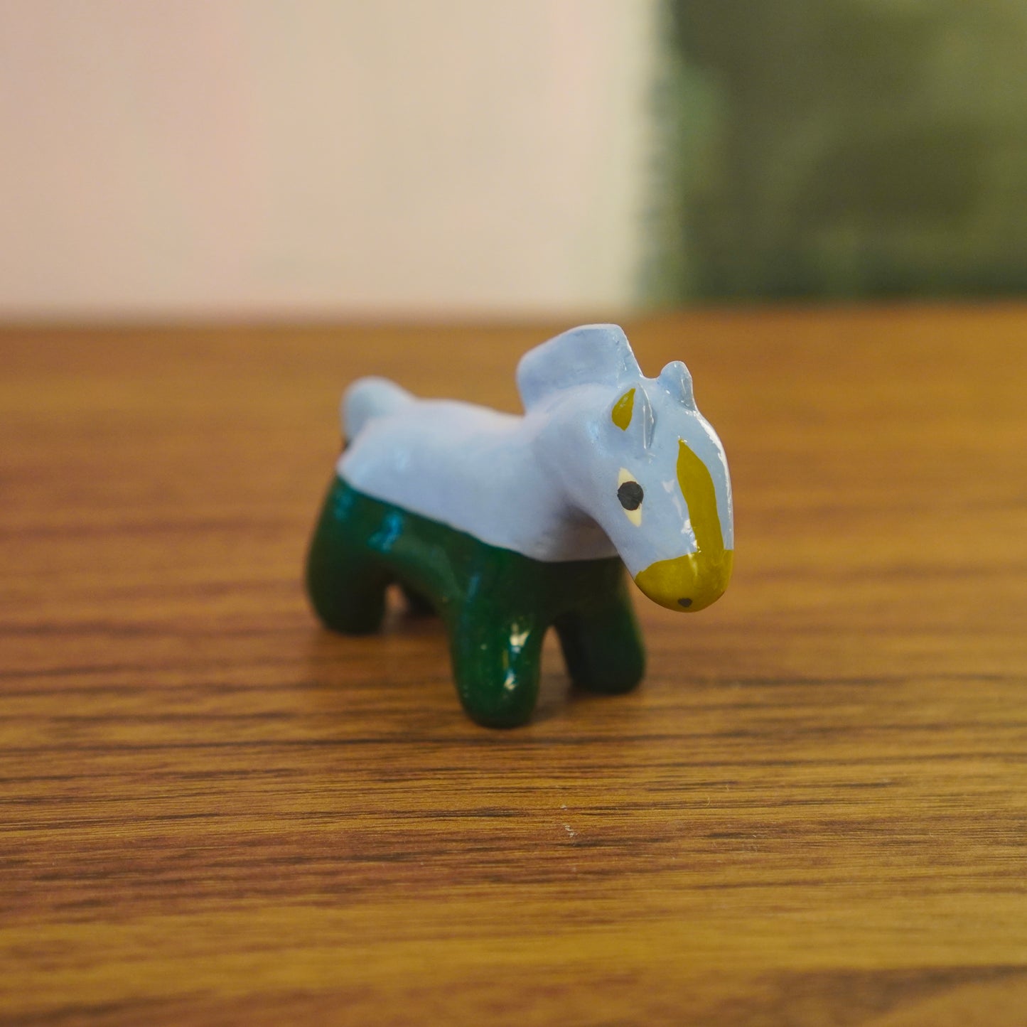 weird pants horse figurine
